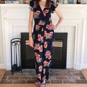 Loveappella Floral jumpsuit in Navy and Pink size Large. Stretch, Rayon/Spandex